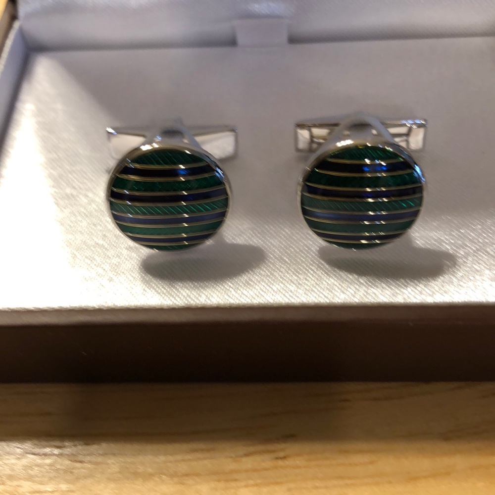 Cuff links green and navy blue in color with silver stems